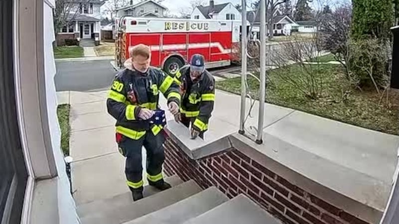 A home security camera captured the touching moment that two South Bend firefighters folded...