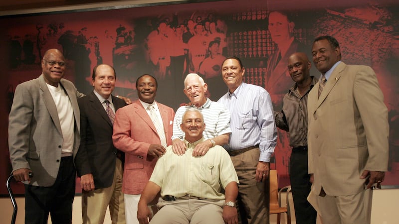 Former Cincinnati Reds stars pose for a group photo after a news conference Saturday, Aug. 25,...
