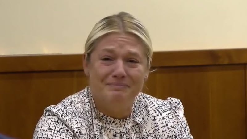 Middletown Police Officer Jamie Patterson broke down on the witness stand and cried during her...