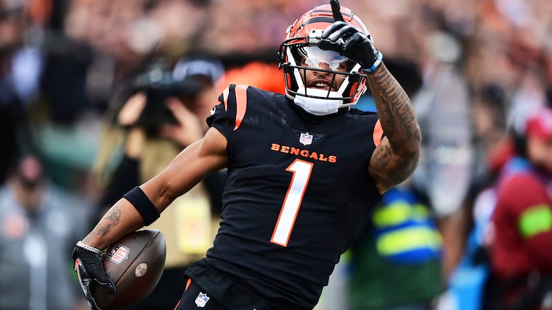 Cincinnati Bengals wide receiver Ja'Marr Chase (1) celebrates after catching a pass during the...