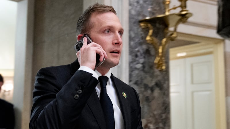 FILE - Rep. Max Miller, R-Ohio, walks out of a meeting with House Majority Leader Steve...