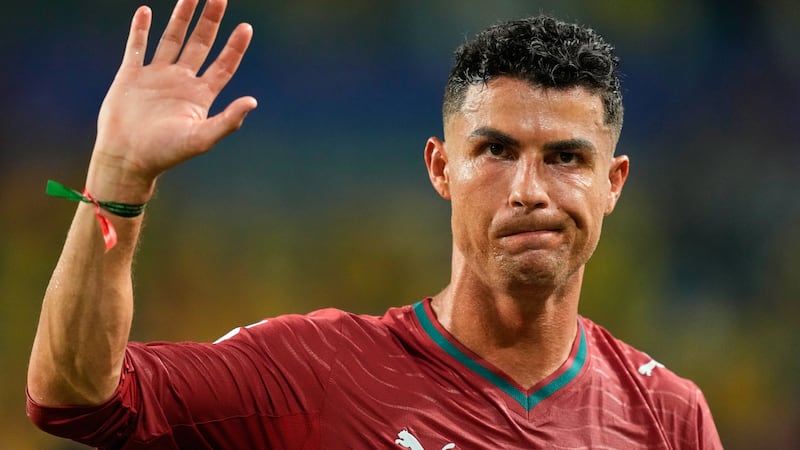 FILE - Portugal's Cristiano Ronaldo waves following the World Cup Group K soccer match between...