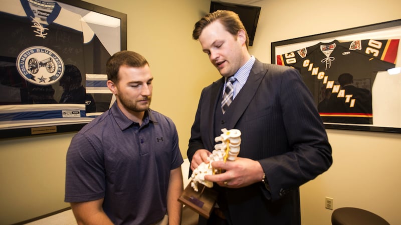 Dr. Michael Planalp treats a patient for a spinal injury at Beacon Orthopaedic.