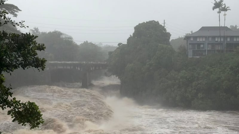 A view of the rising water levels at the Wainaku Street Bridge in Hilo on the Big Island of...