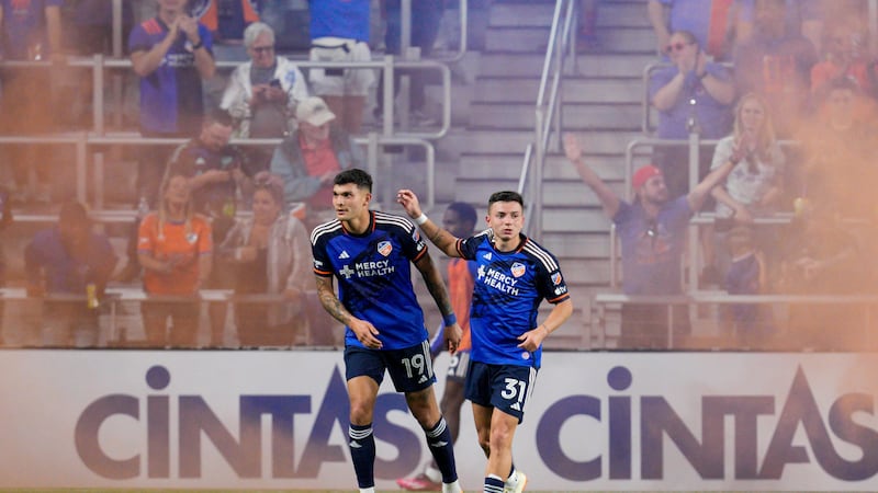 FC Cincinnati forward Brandon Vázquez, left, celebrates with Álvaro Barreal (31) after scoring...