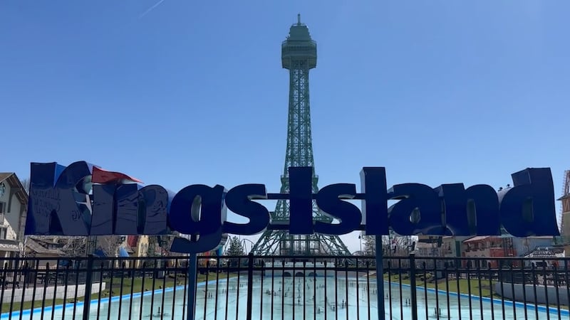 Woman says stranger reached under stall and slid phone with camera open, during trip to Kings...