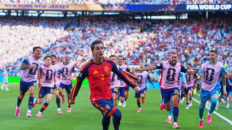 Spain's Ferran Torres (7) celebrates scoring their first goal during the World Cup final...