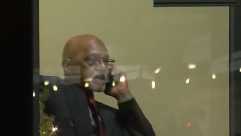 Elwood Jones sits at CPD District 2 after he was taken into police custody, facing charges of...
