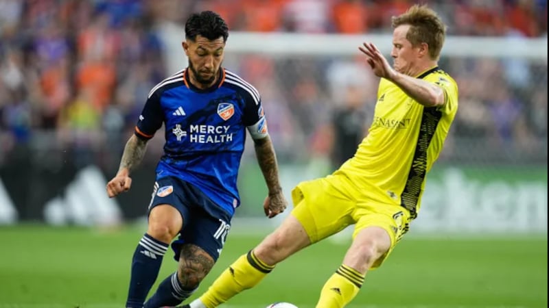FC Cincinnati's Luciano Acosta and Nashville SC.
