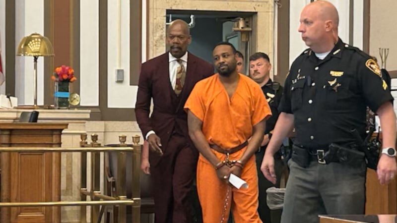Rodney Hinton Jr. walks into a Hamilton County courtroom with his attorney on May 13, 2025.