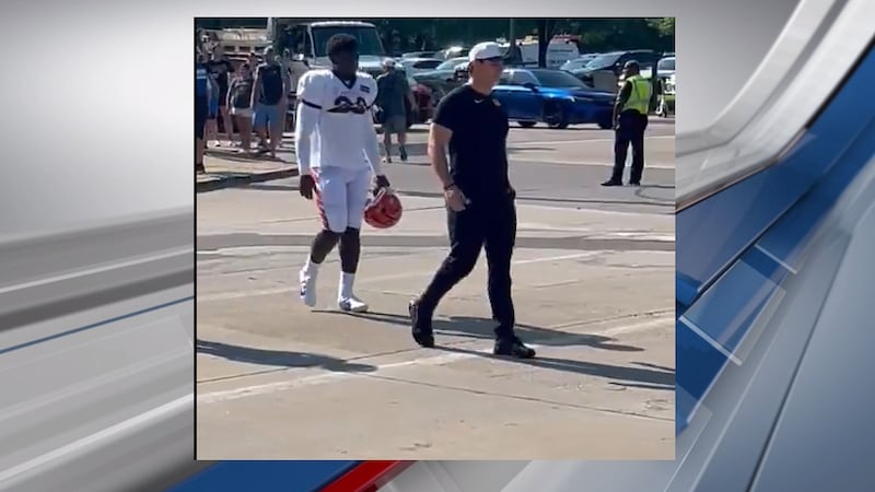 Trey Hendrickson arrived in street clothes to Bengals practice Wednesday, marking the end of...
