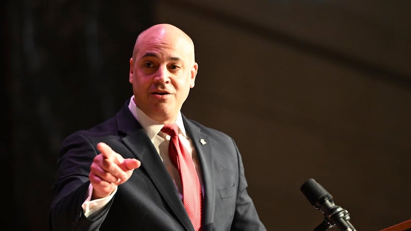 FILE - Dave Sunday gestures while speaking to the audience in the Forum Auditorium across the...