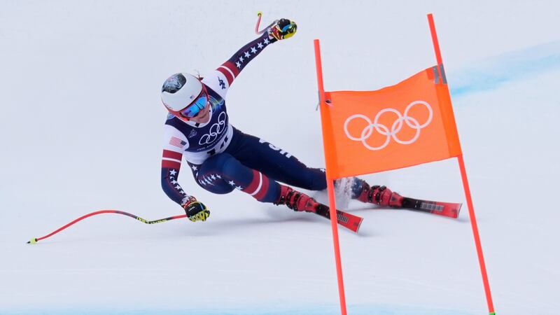 United States' Breezy Johnson speeds down the course during an alpine ski, downhill portion of...