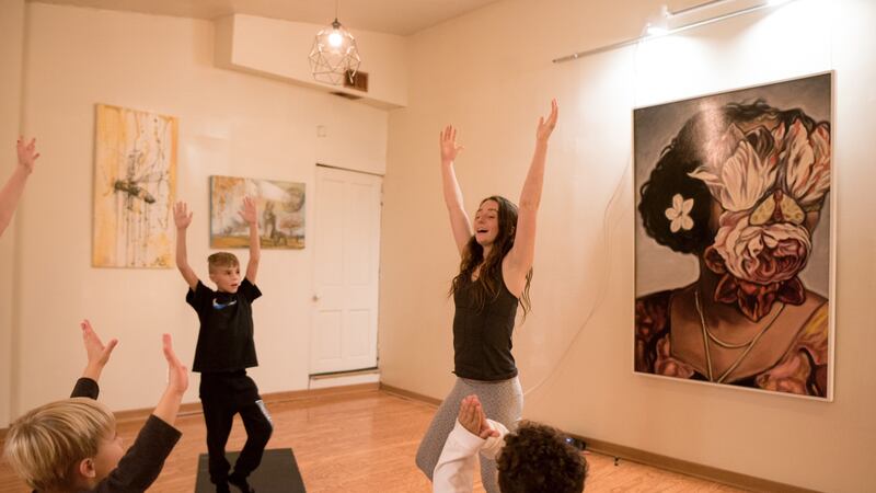 Emily Hunt teaches yoga to children across the Tri-State after launching her mobile business,...