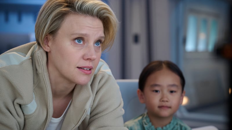 Kate McKinnon and Yeji Kim in IN THE BLINK OF AN EYE. Photo by Searchlight Pictures/Kimberley...