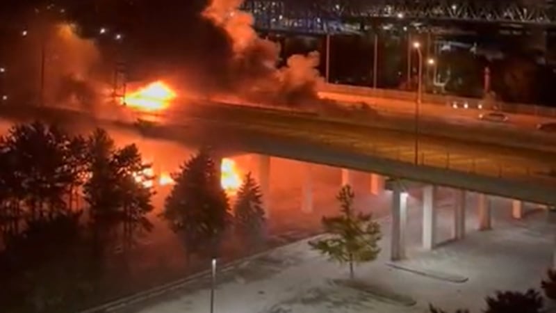 Large flames and heavy smoke can be seen in videos engulfing the Daniel Carter Beard Bridge.