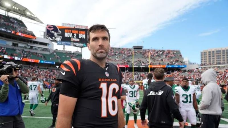The Cincinnati Bengals' Joe Flacco walks off the field after the Bengals lost to the New York...