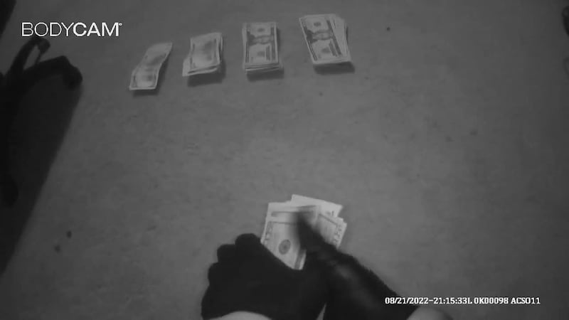 Two Adams County deputies were responsible for counting, bagging and tagging the cash for...
