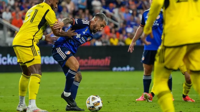 FC Cincinnati's Luciano Acosta fights for control of the ball during the FC Cincinnati vs....