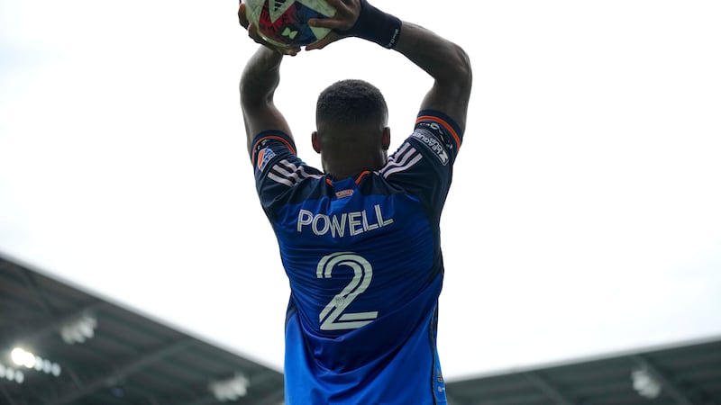 Cincinnati defender Alvas Powell inbounds the ball during a Leagues Cup soccer match against...