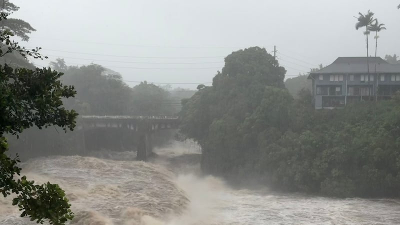 A view of the rising water levels at the Wainaku Street Bridge in Hilo on the Big Island of...