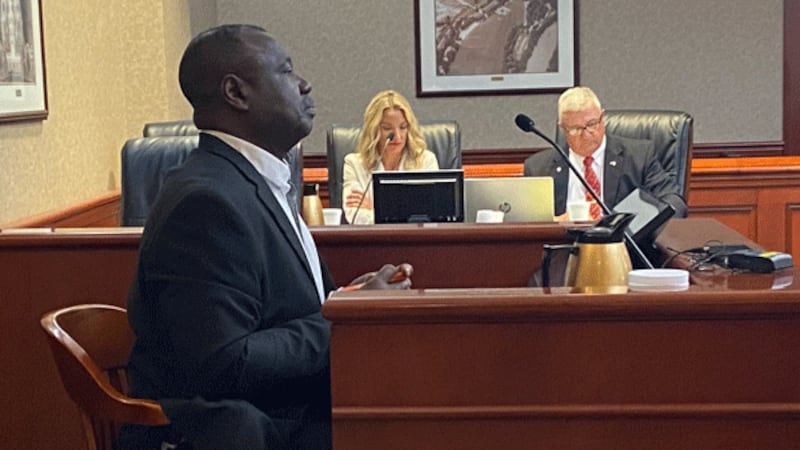 Lakota School Board Member Isaac Adi testifies Friday in Butler County Common Pleas Court as...