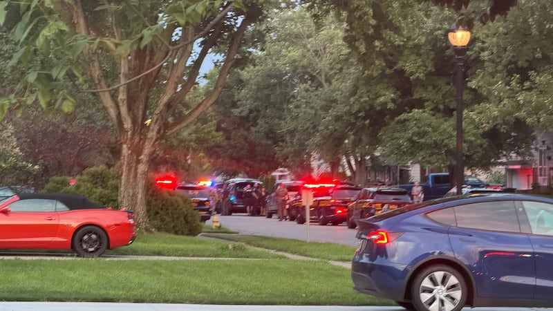 Police respond to a large scene in a neighborhood in Mason, Ohio.