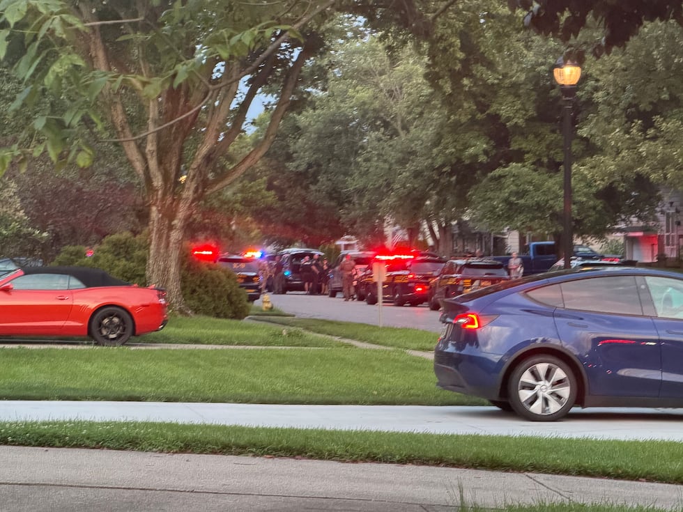 A woman was shot, and a man was taken into custody at a home on Windward Drive in Mason...
