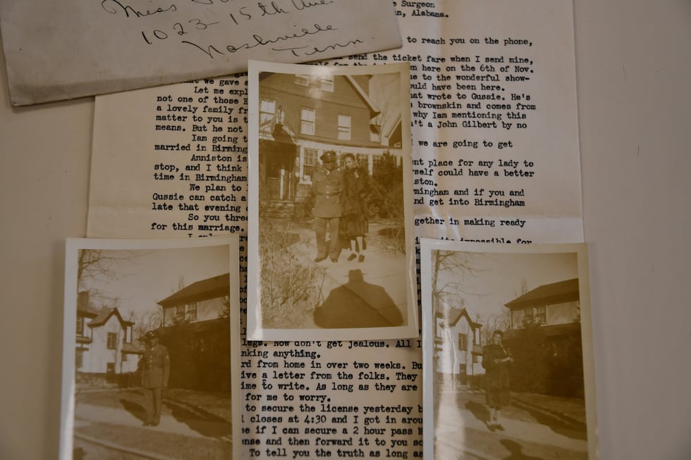 Pictures of William Raymond Whittaker and his wife, Jane Dean Whittaker, are on top of letters...