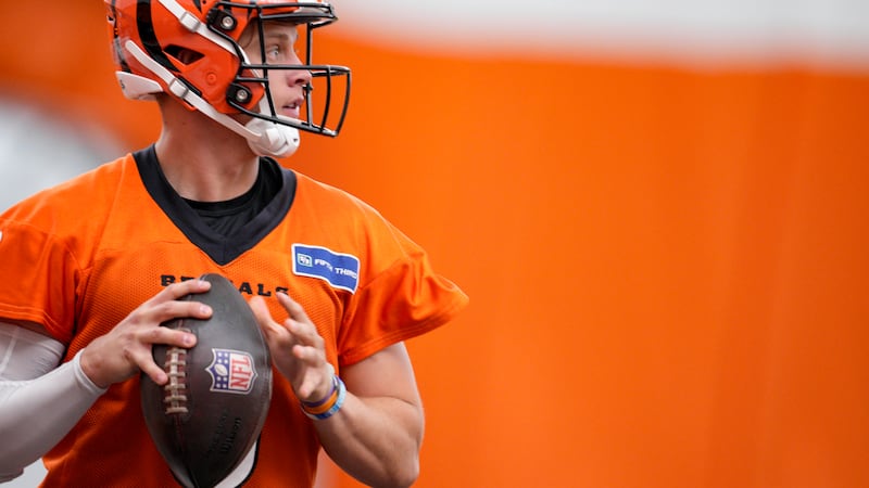Cincinnati Bengals quarterback Joe Burrow looks to throw during an NFL football practice,...