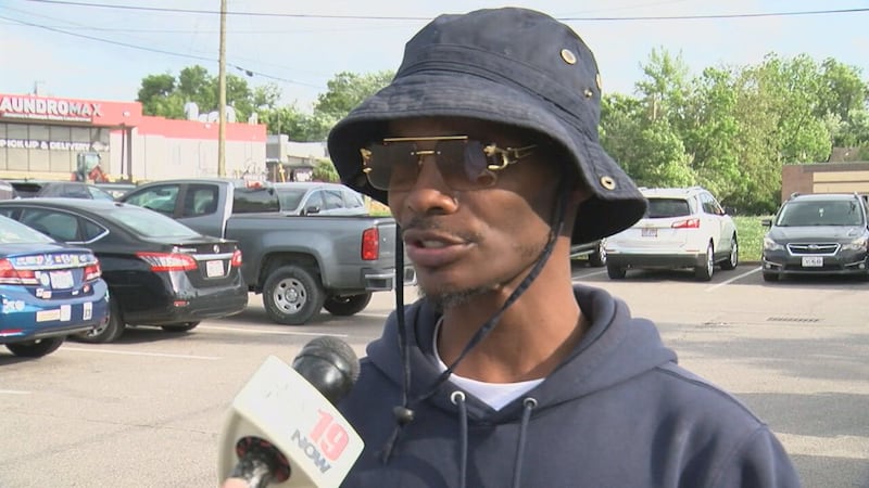 Angel Moses was arrested outside a downtown Cincinnati bank on a charge of failure to disclose...