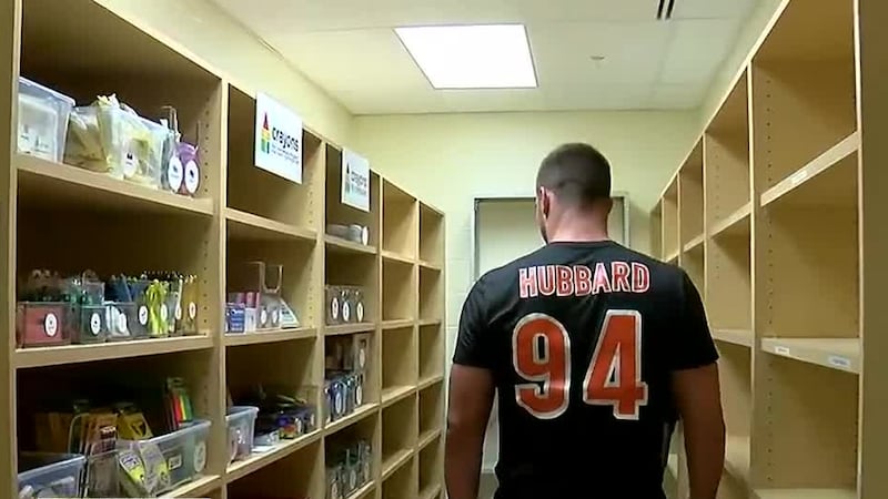 Sam Hubbard will be at Holmes Middle School on Tuesday passing out backpacks and school...