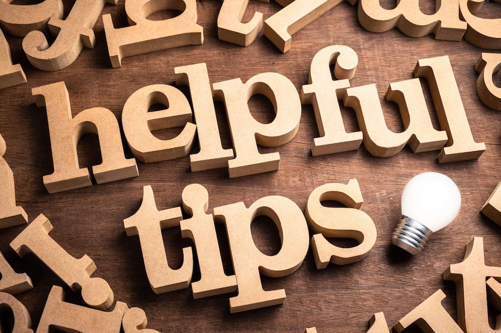 Helpful Tips spelled out with wooden blocks.