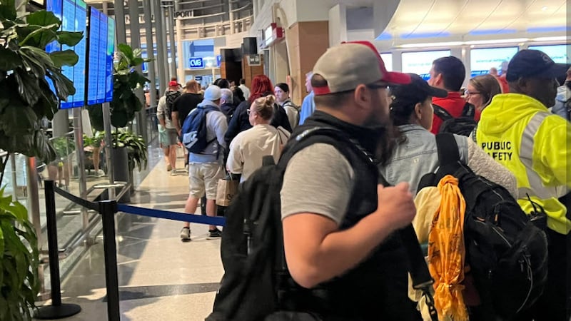 Long lines formed by 5 a.m. Friday at Cincinnati/Northern Kentucky International Airport. This...
