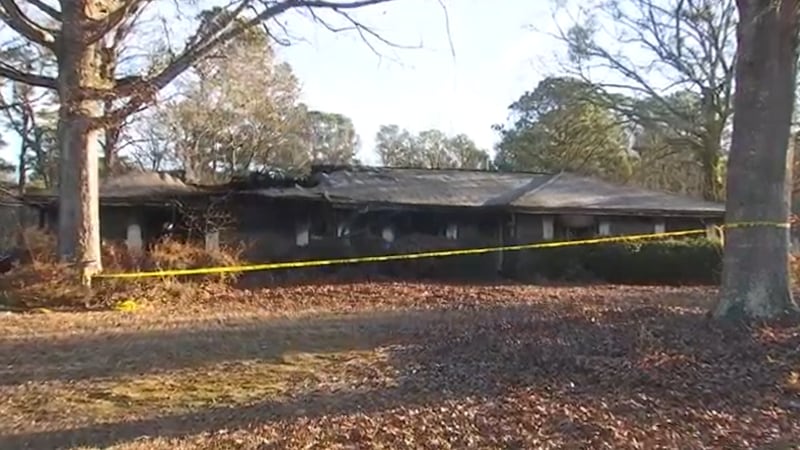 A man in Georgia died after he went back inside a burning home to rescue the family dog.