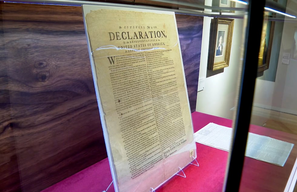 A copy of the Declaration of Independence, printed by Robert Luist Fowle in July 1776, sits on...
