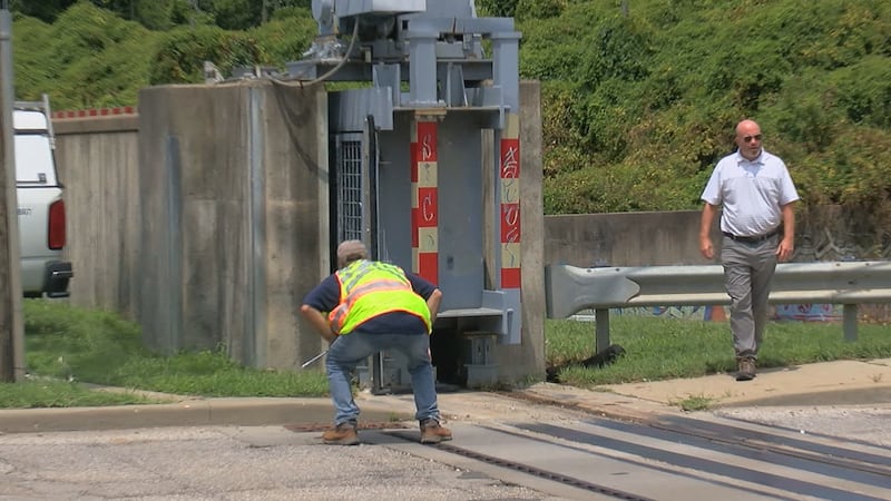 City crews inspect Duck Creek floodgate as council member pushes for answers on Friday...
