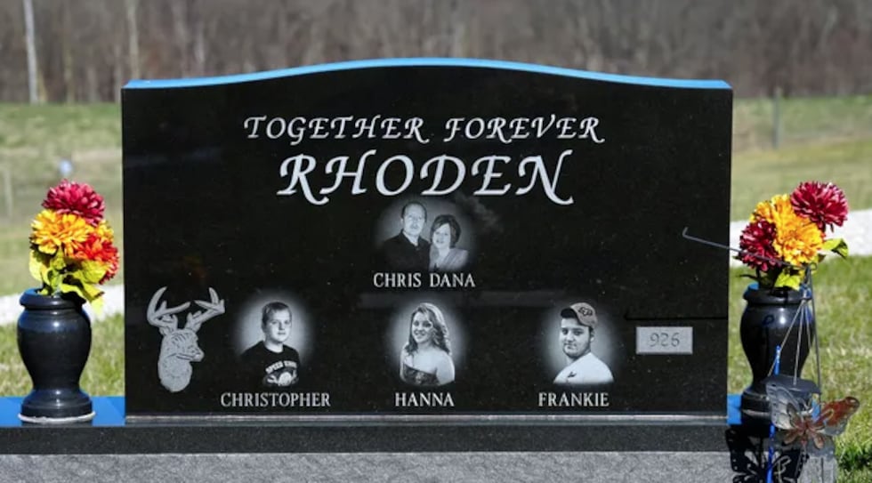 Five members of the Rhoden family are buried on a hillside at Scioto Burial Park in McDermott,...