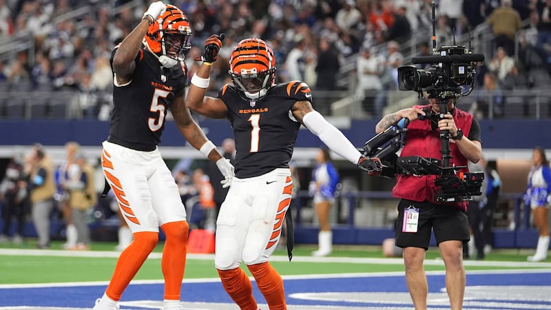 Cincinnati Bengals wide receiver Ja'Marr Chase (1) celebrates his touchdown with wide receiver...