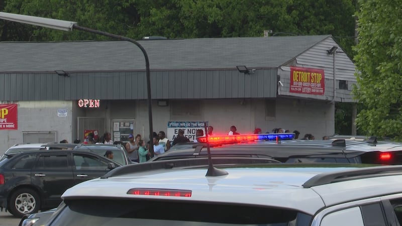 Police respond to a shooting that injured at least 12 people at the Old West End Festival in...