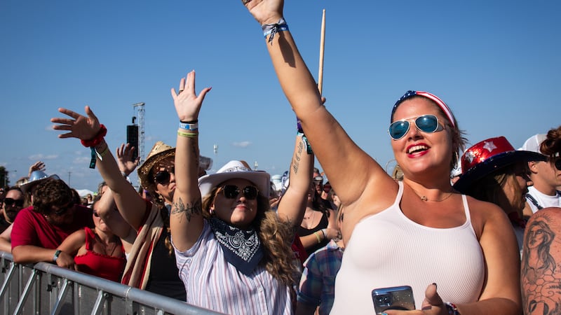 Fans enjoying Cooper Alan's set at Voices of America Country Music Festival.