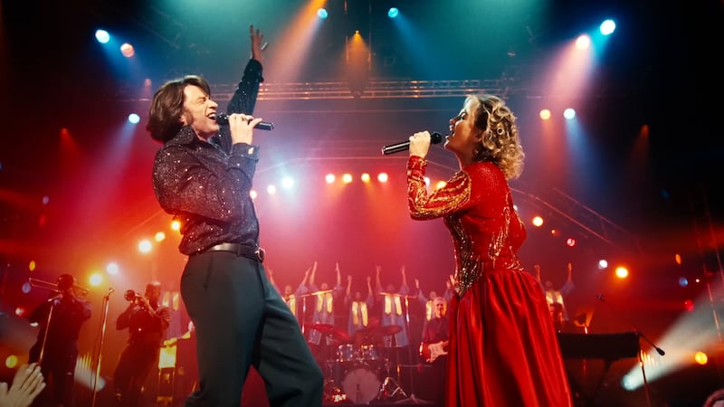“Song Sung Blue” is in theaters courtesy of Focus Features December 25th.