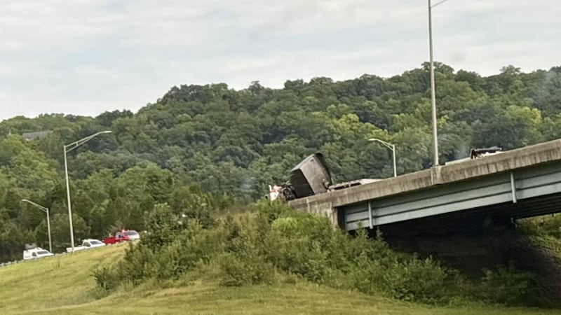 A multi-vehicle crash involving a semi leaking fuel is blocking most lanes on eastbound...