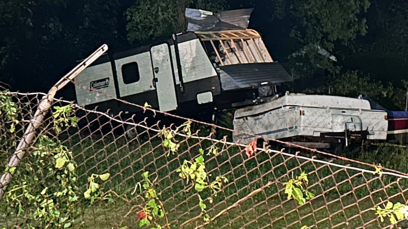 FOX19 NOW’s Jordan Vilines say downed trees fences toppled over and this Coleman camper that...