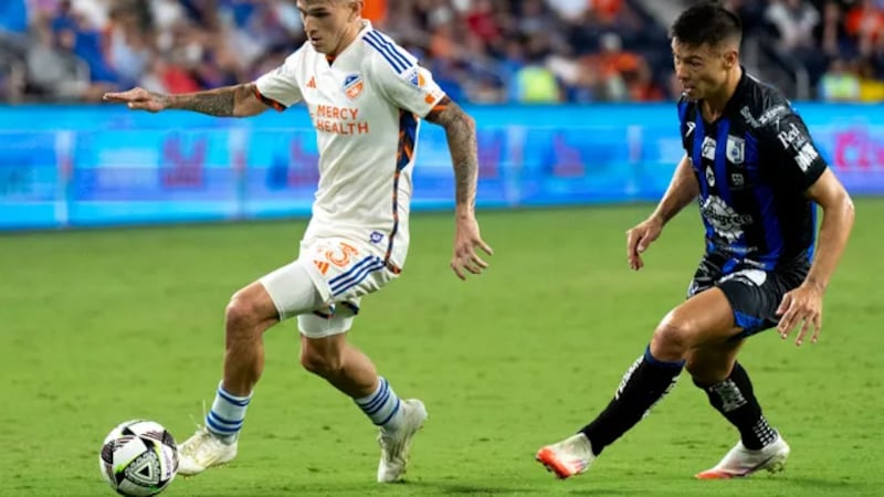 FC Cincinnati midfielder Luca Orellano (23) handles the ball as Querétaro midfielder Federico...