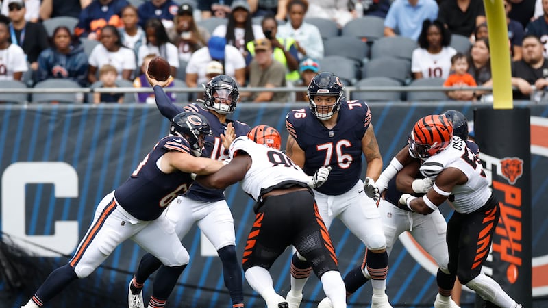 Chicago Bears quarterback Caleb Williams (18) passes the ball against the Cincinnati Bengals...