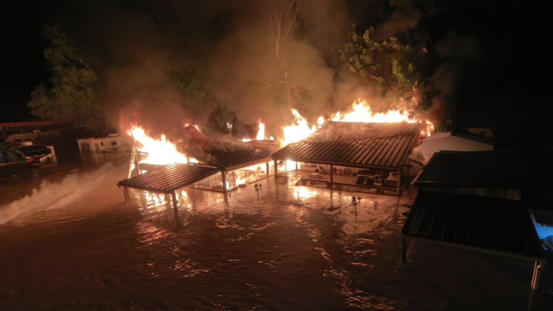 At least two camper awnings ignited, and propane tanks exploded at Robinson’s Whitewater River...