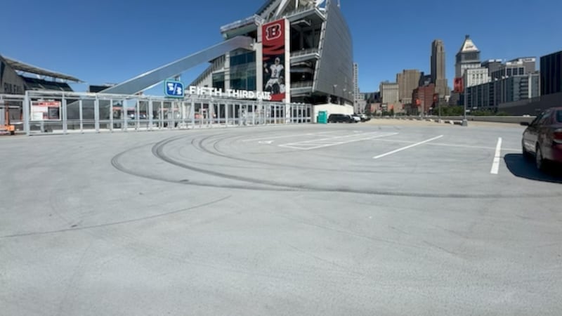 Tire marks left in the parking lot outside of Paycor Stadium.