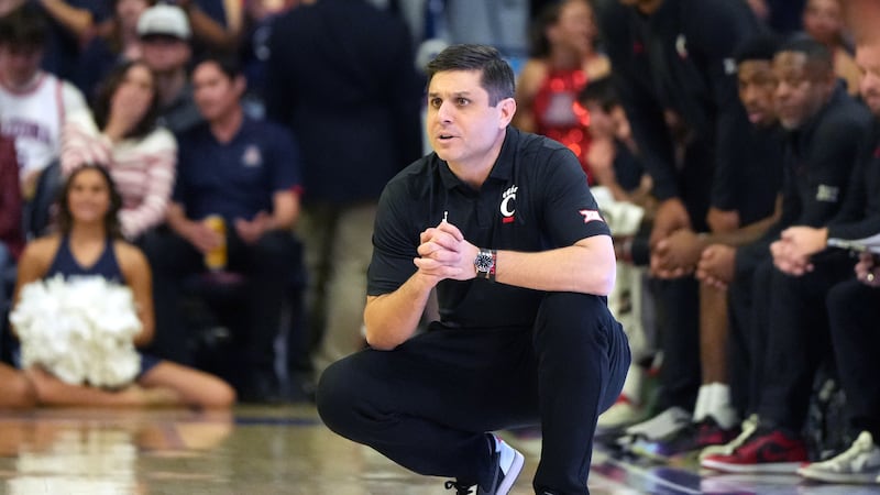 Cincinnati head coach Wes Miller during the first half of an NCAA college basketball game...