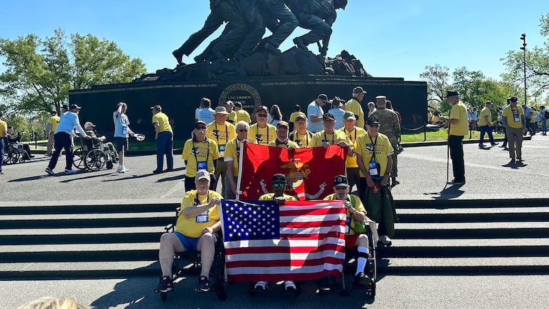 Marines, who served during the Vietnam War, visited the USMC Marine Corps War Memorial in...